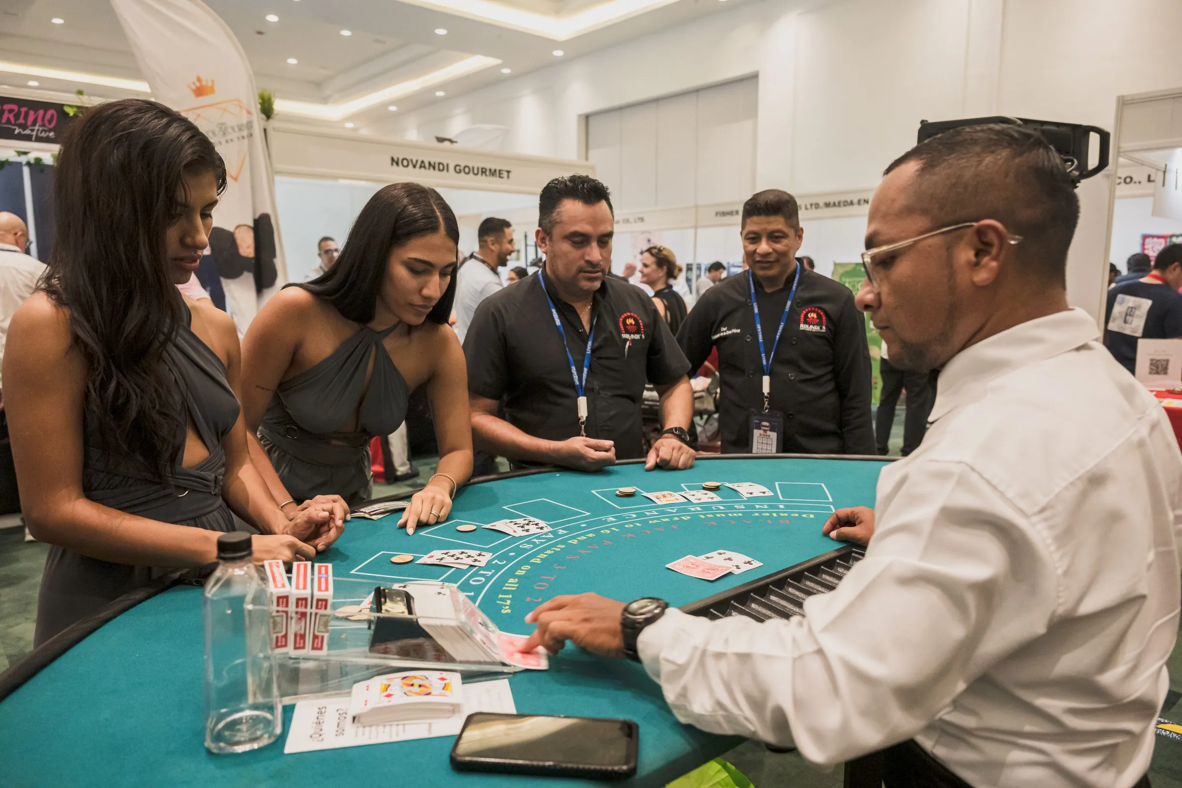 Attendees engaged at a casino table activity, actively participating in the event