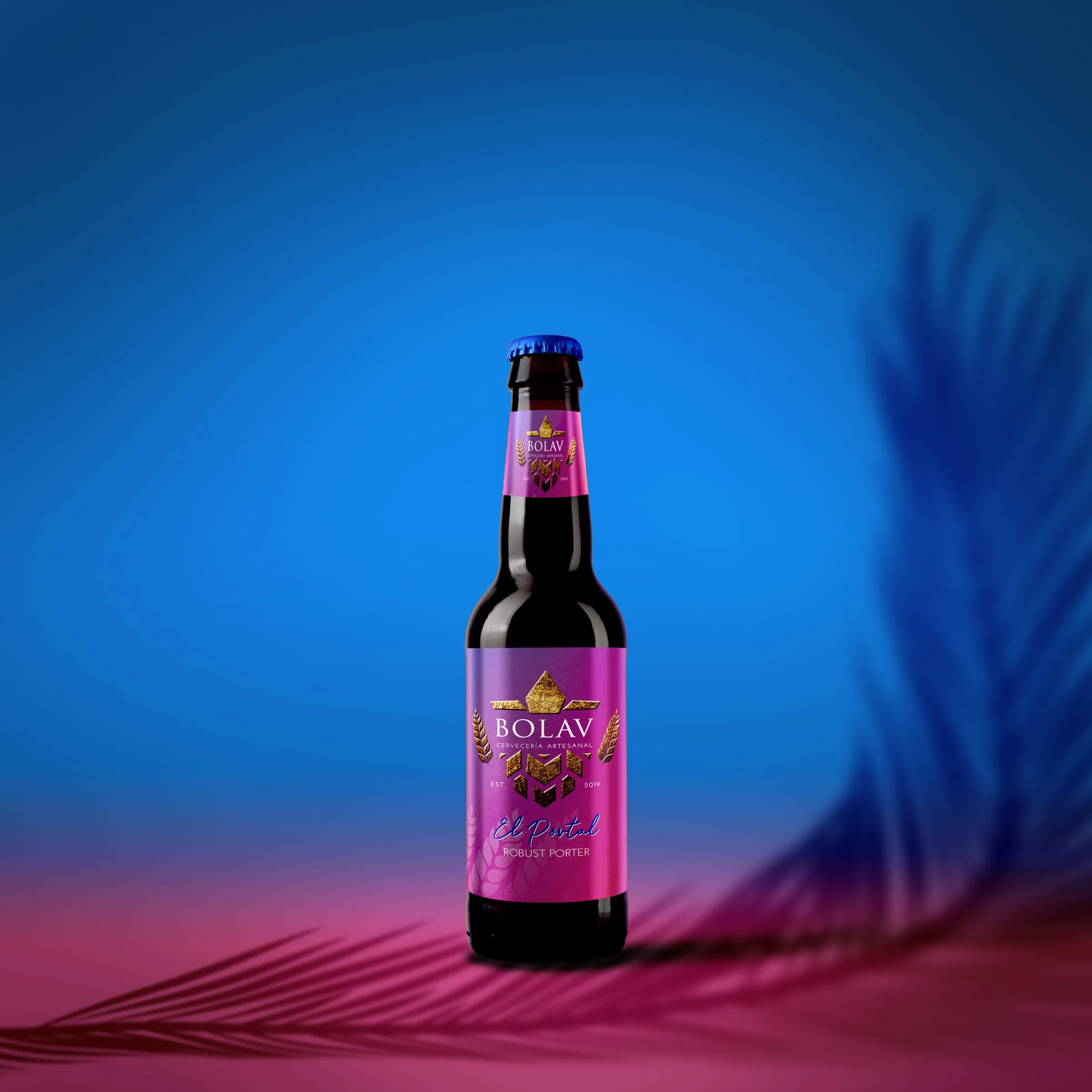 Bottle of El Portal Robust Porter beer with a purple label, set against a gradient background shifting from blue to pink with blurred wheat stalks